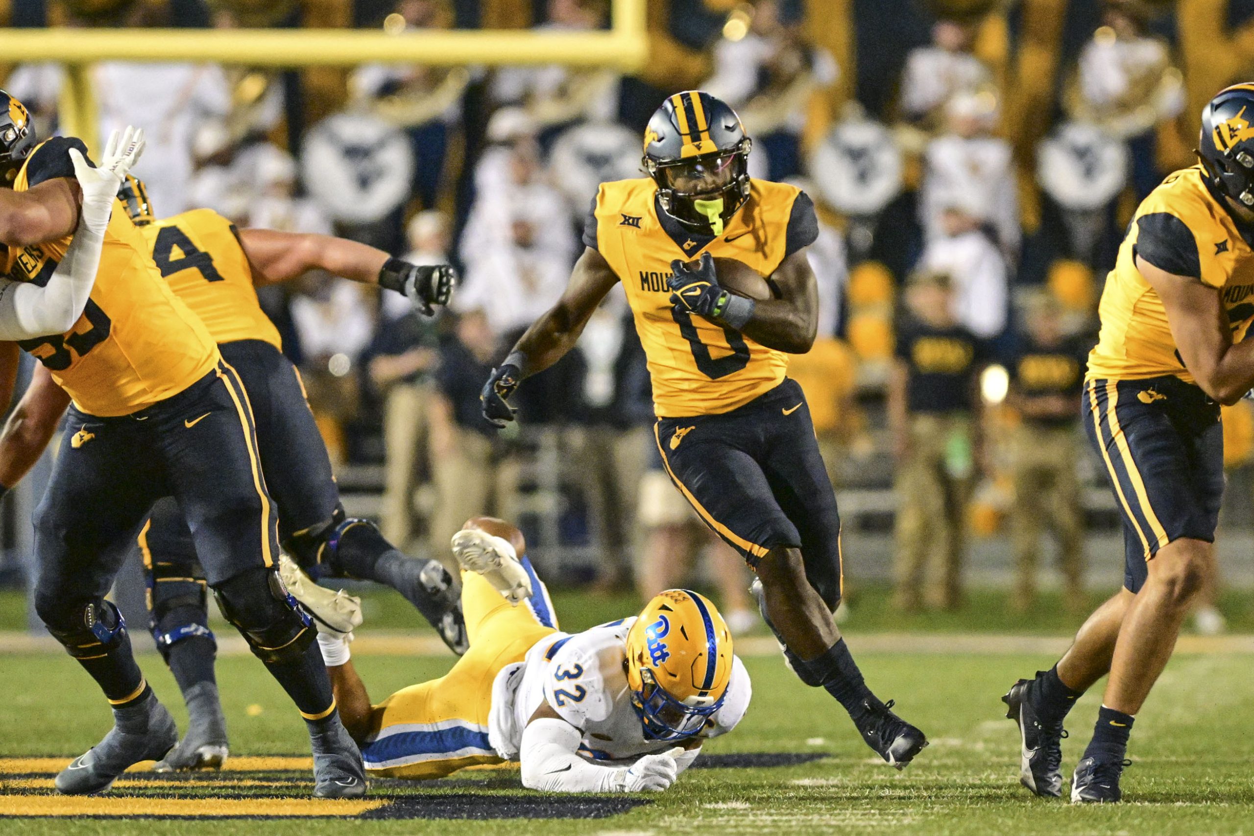 CJ Donaldson, Garrett Greene hurt in West Virginia's 17-6 win over Pittsburgh in 'Backyard Brawl'